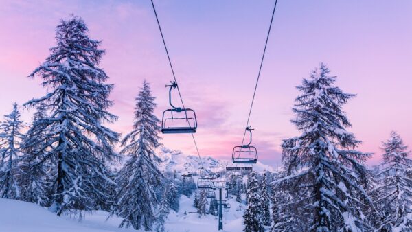 sunset over a chair lift, pink sky